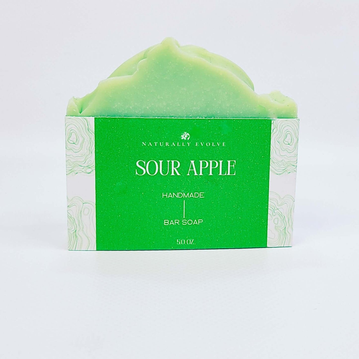 Sour Apple bar soap with a crisp, sweet, tangy scent for a refreshing and invigorating shower experience, made with natural ingredients.