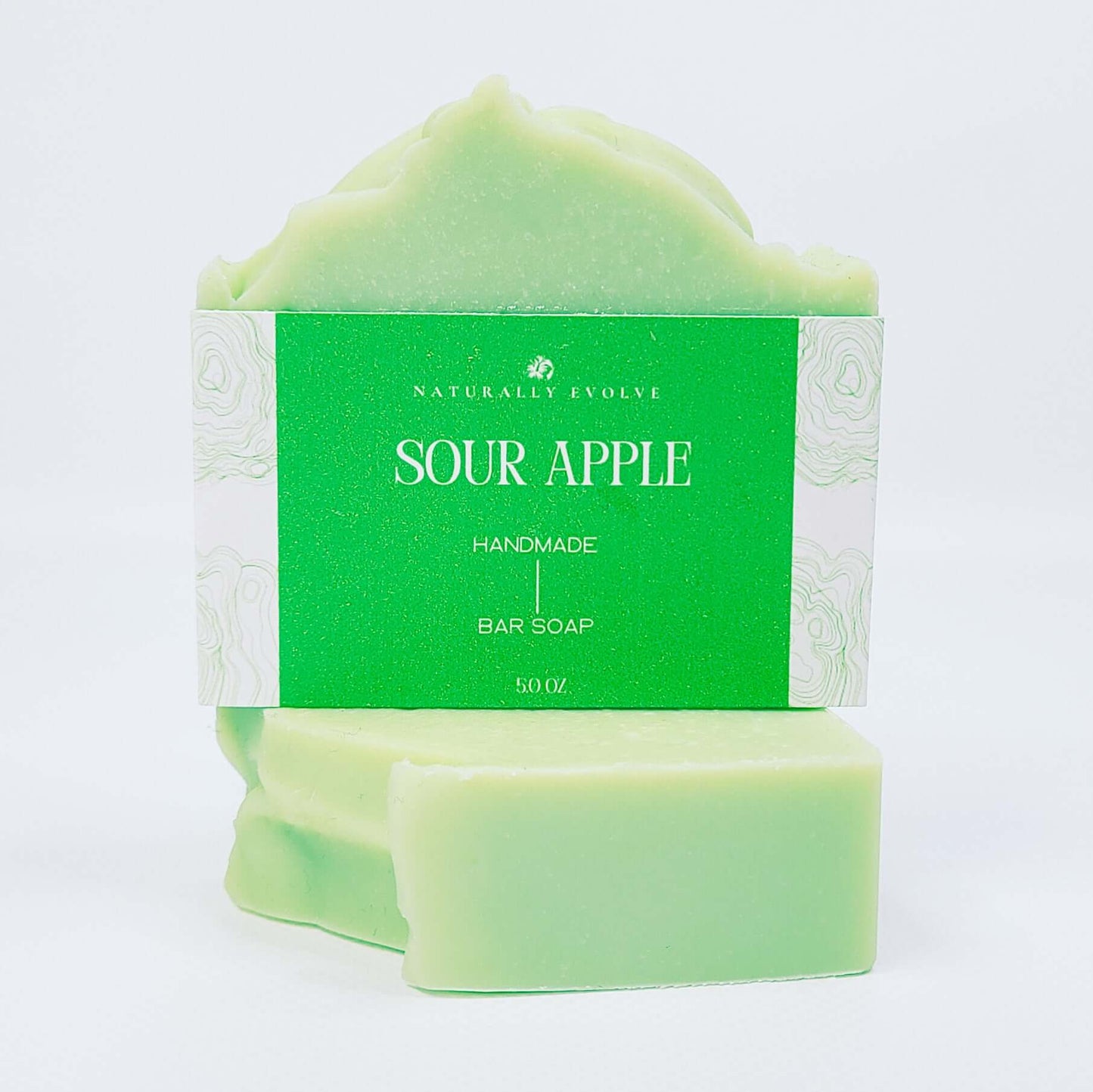Sour Apple soap bar with a fresh, tangy scent, made from natural ingredients. Bright green color, invigorating and playful shower experience.
