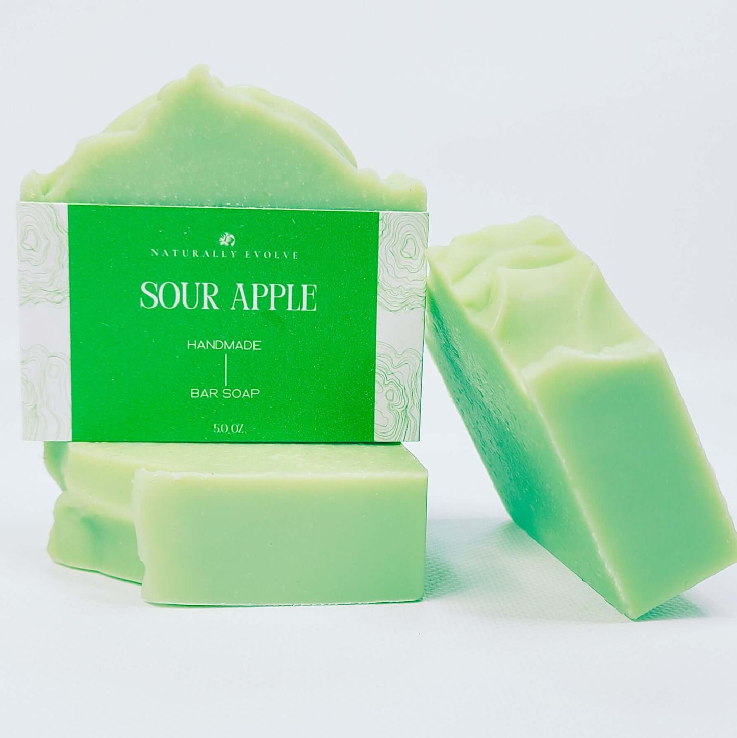 Sour Apple handmade bar soap with fresh, tangy scent and natural ingredients, offering a playful and invigorating shower experience.