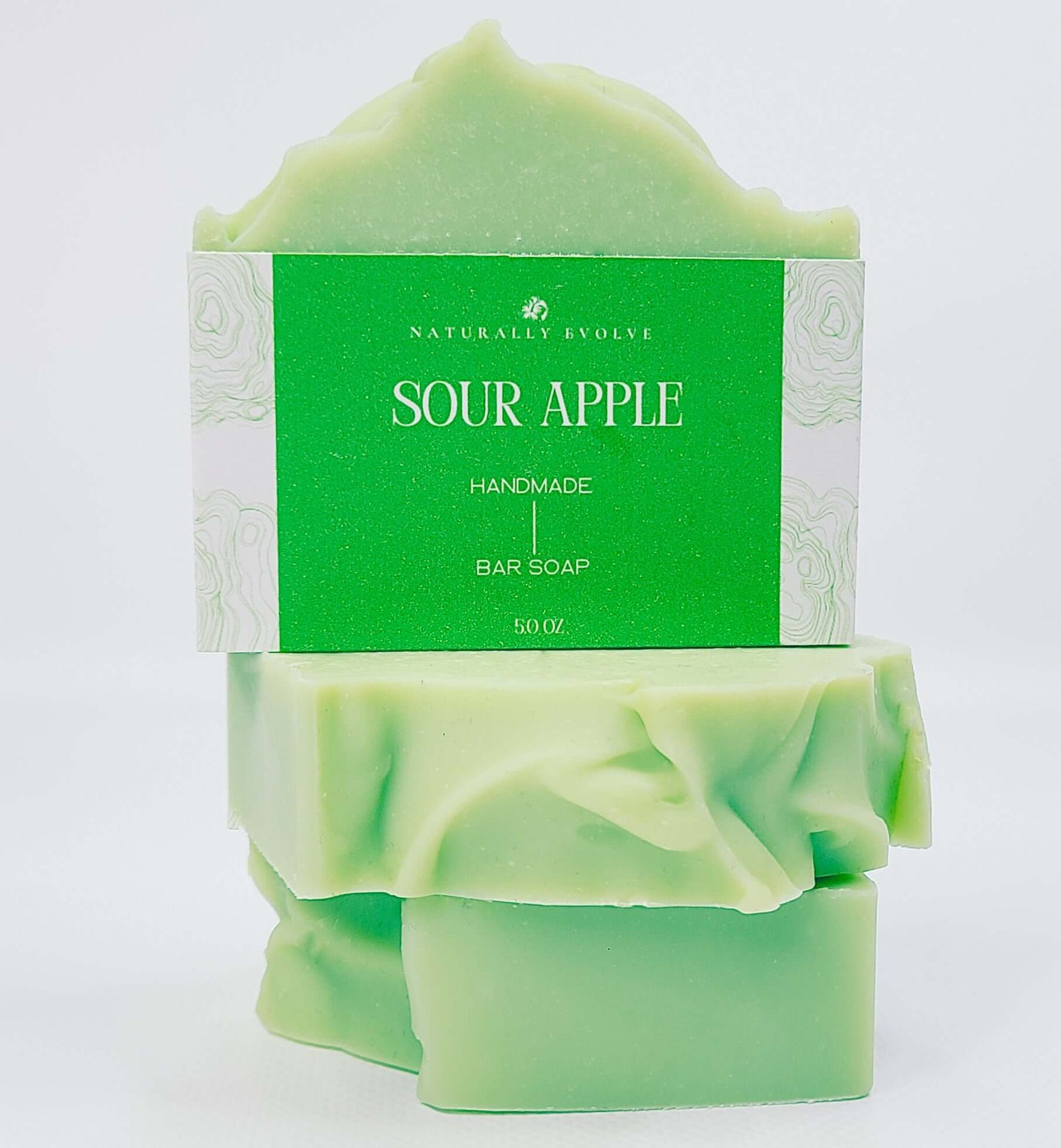 Sour Apple handmade bar soap with a crisp, fruity scent offering a refreshing and invigorating shower experience.