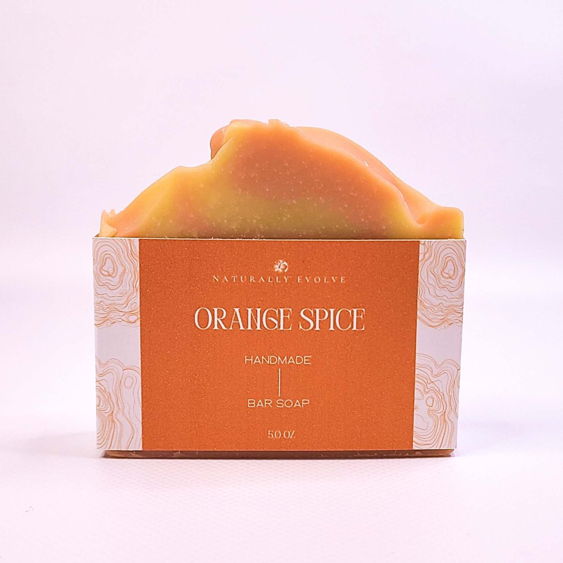 Orange Spice handmade bar soap with invigorating citrus and spice scent, perfect for cleansing and energizing skin naturally.