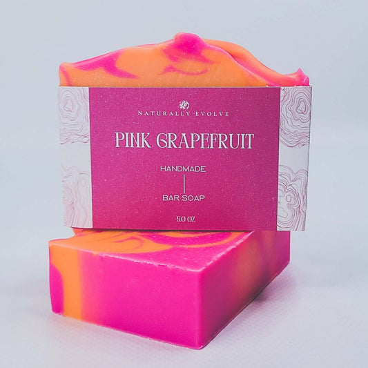 Pink Grapefruit handmade bar soap with vibrant colors, perfect for a refreshing and uplifting morning shower routine.