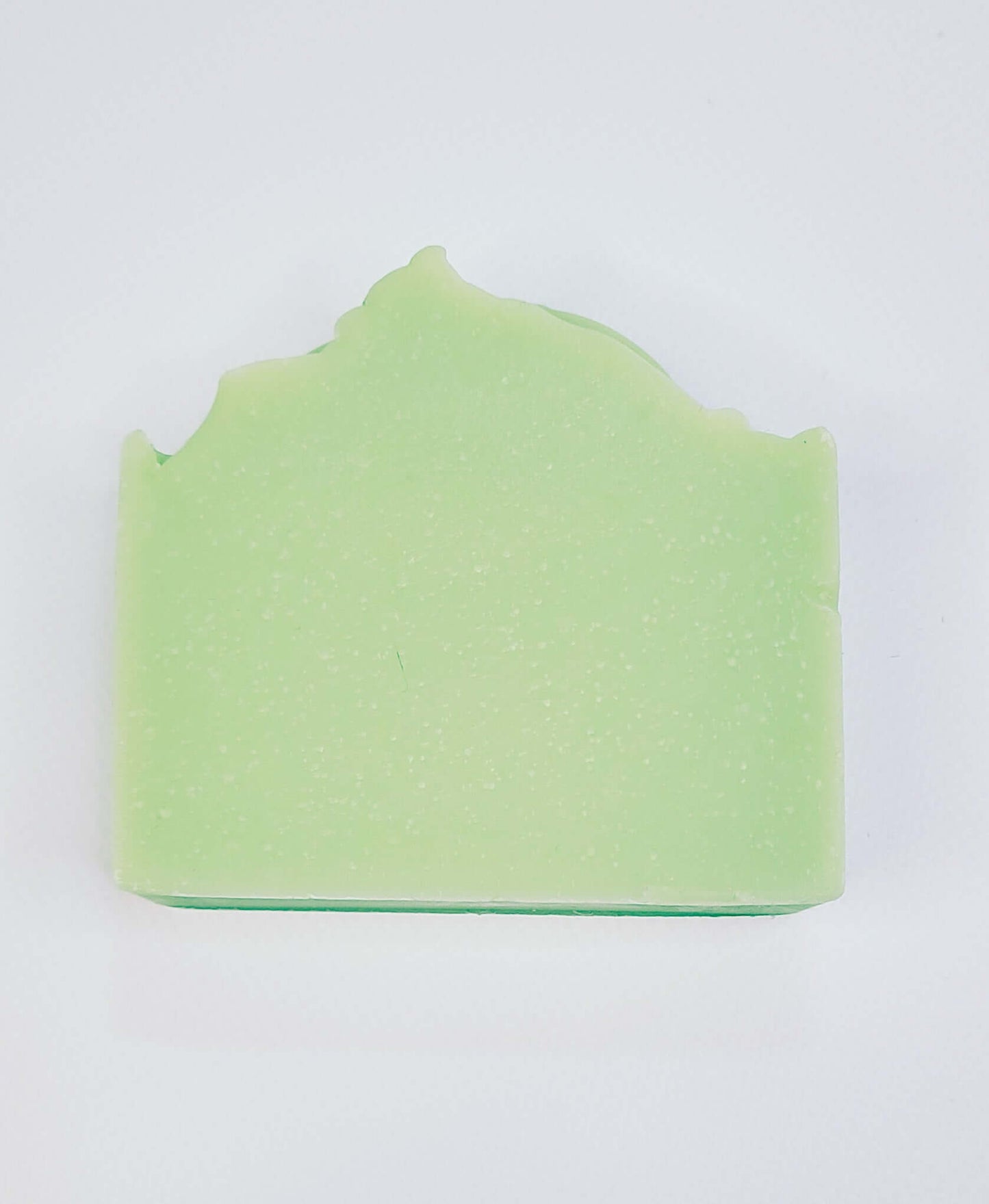 Light green Sour Apple soap bar with a playful, fruity scent for an invigorating and refreshing shower experience.